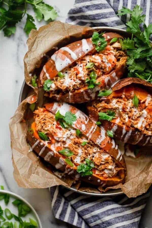 Overhead view of Slow Cooker Buffalo Chicken Sweet Potatoes as the best healthy crockpot meals to feed a crowd
